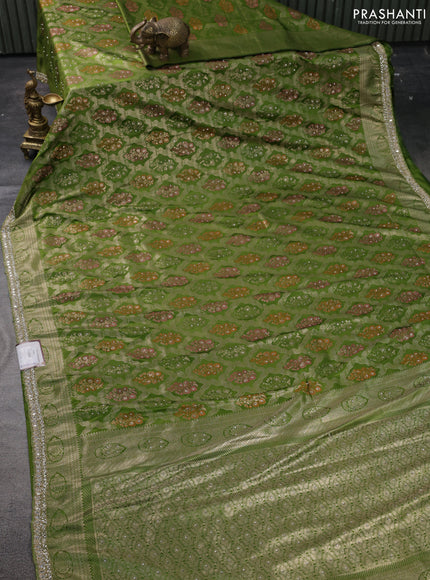 Banarasi silk saree mehendi green with allover zari woven brocade weaves and embroidery mirror work border