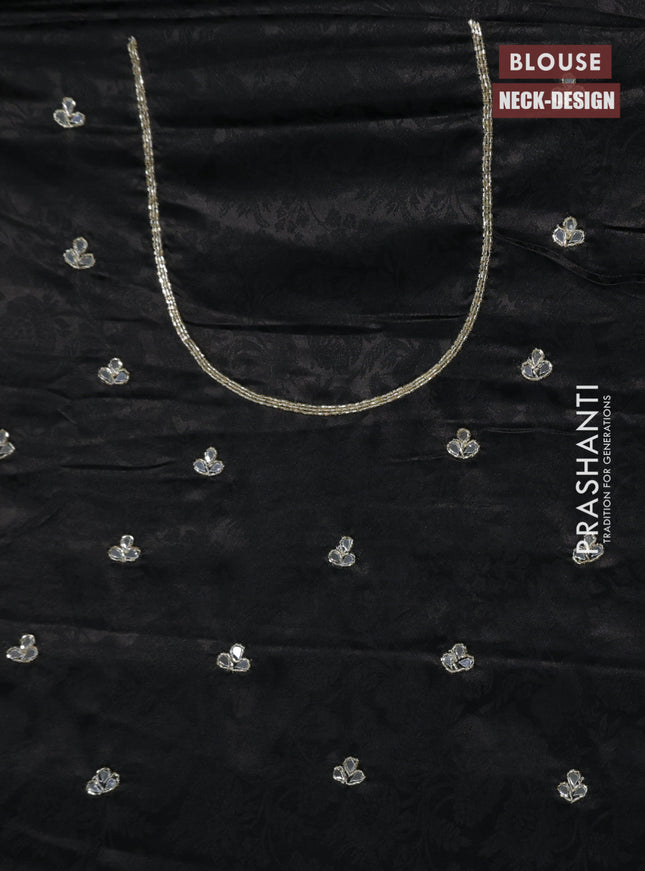 Banarasi silk saree black with allover zari woven floral brocade weaves and embroidery mirror work border