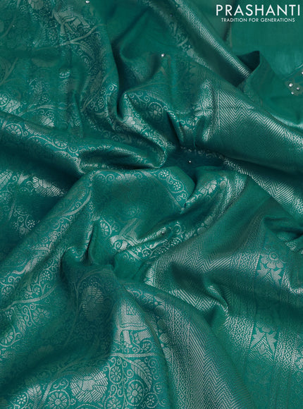 Banarasi silk saree teal green with allover zari woven brocade weaves and embroidery mirror work border