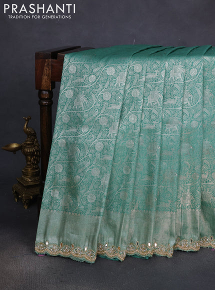 Banarasi silk saree pastel green with allover zari woven brocade weaves and embroidery mirror work border