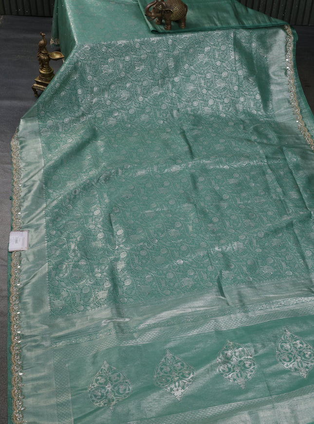 Banarasi silk saree pastel green with allover zari woven brocade weaves and embroidery mirror work border