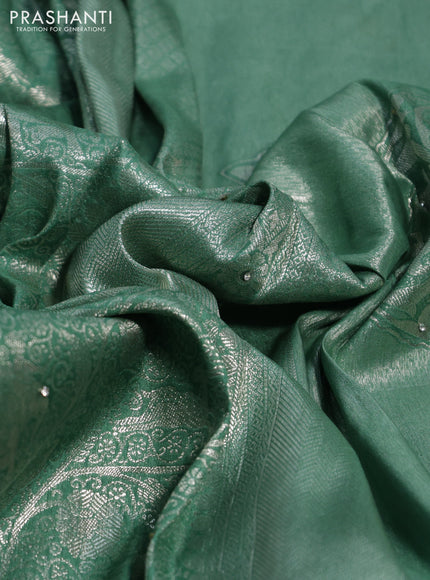 Banarasi silk saree pastel green with allover zari woven brocade weaves and embroidery mirror work border