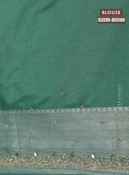 Banarasi silk saree pastel green with allover zari woven brocade weaves and embroidery mirror work border