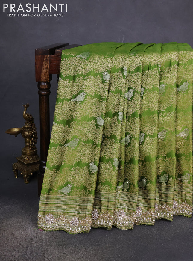 Banarasi silk saree light green with allover zari woven brocade weaves and embroidery mirror work border