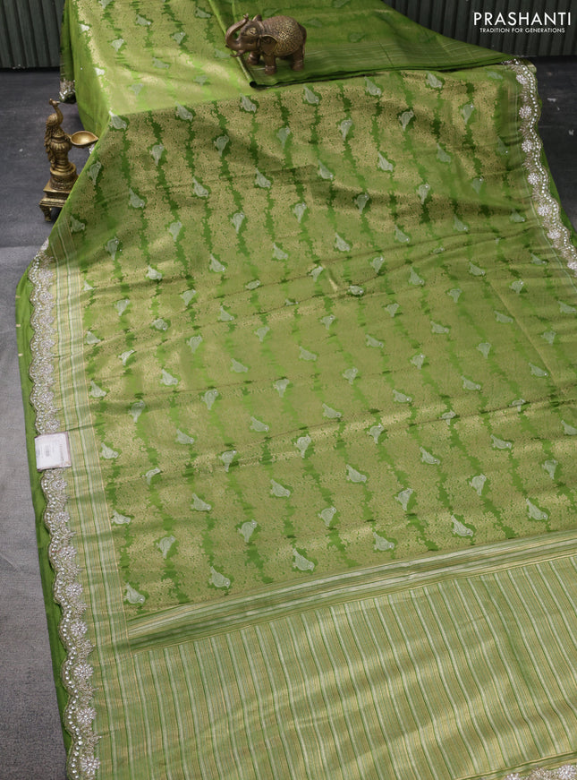 Banarasi silk saree light green with allover zari woven brocade weaves and embroidery mirror work border
