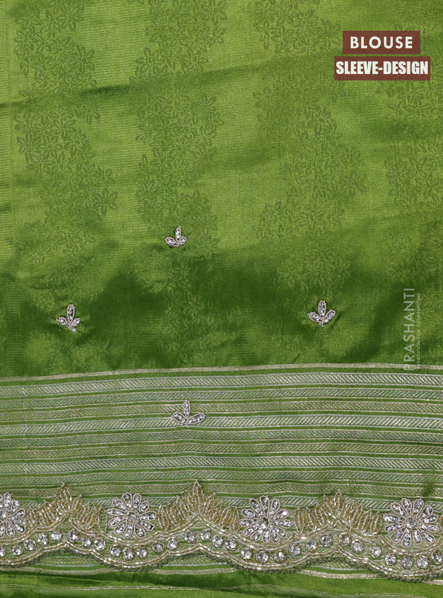 Banarasi silk saree light green with allover zari woven brocade weaves and embroidery mirror work border