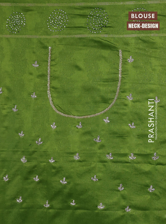 Banarasi silk saree light green with allover zari woven brocade weaves and embroidery mirror work border