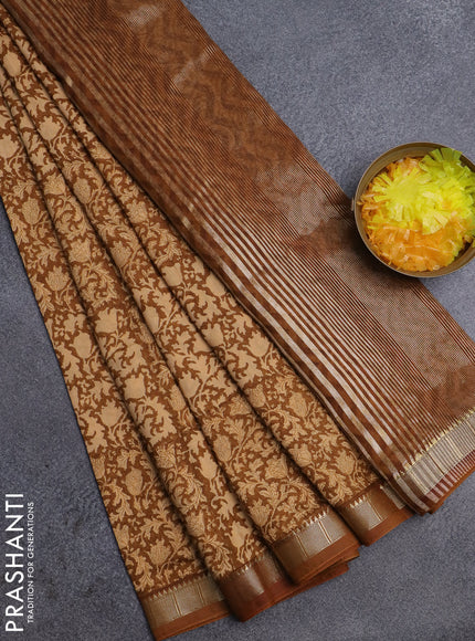 Semi chanderi saree sandal and dark mustard with allover prints and zari woven border