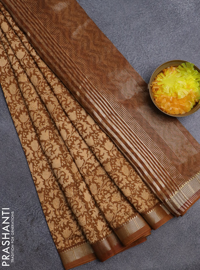 Semi chanderi saree sandal and dark mustard with allover prints and zari woven border