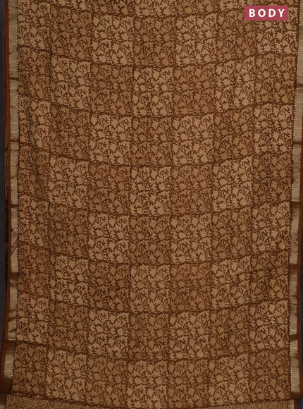 Semi chanderi saree sandal and dark mustard with allover prints and zari woven border