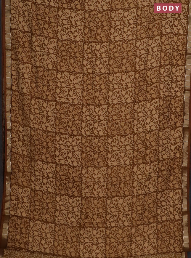 Semi chanderi saree sandal and dark mustard with allover prints and zari woven border