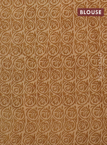 Semi chanderi saree sandal and dark mustard with allover prints and zari woven border