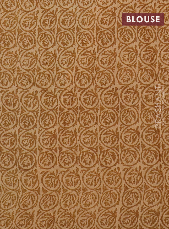 Semi chanderi saree sandal and dark mustard with allover prints and zari woven border