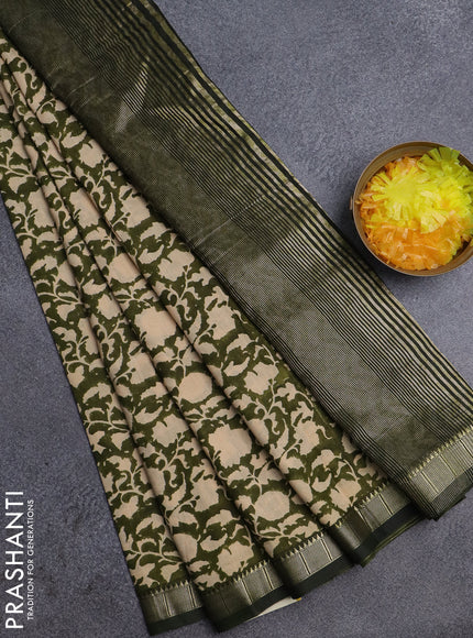 Semi chanderi saree sap green and sandal with allover prints and zari woven border