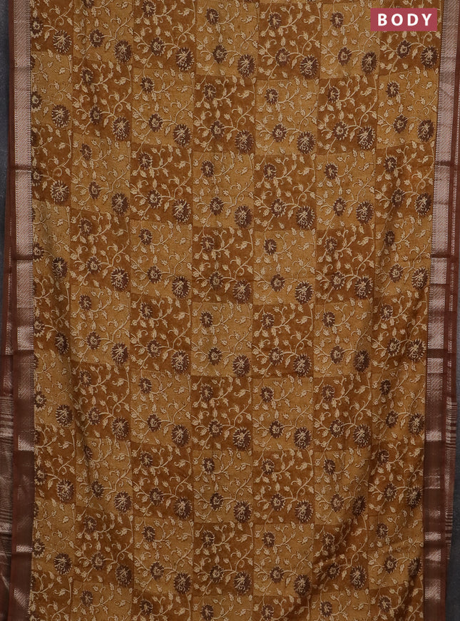 Semi chanderi saree mustard shade and brown with allover floral prints and zari woven border