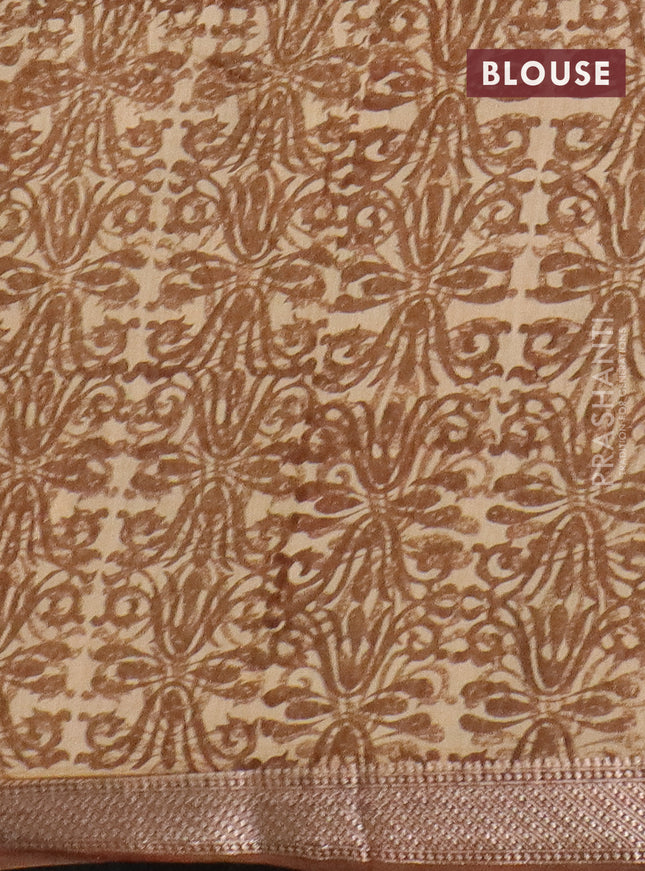 Semi chanderi saree mustard shade and brown with allover floral prints and zari woven border