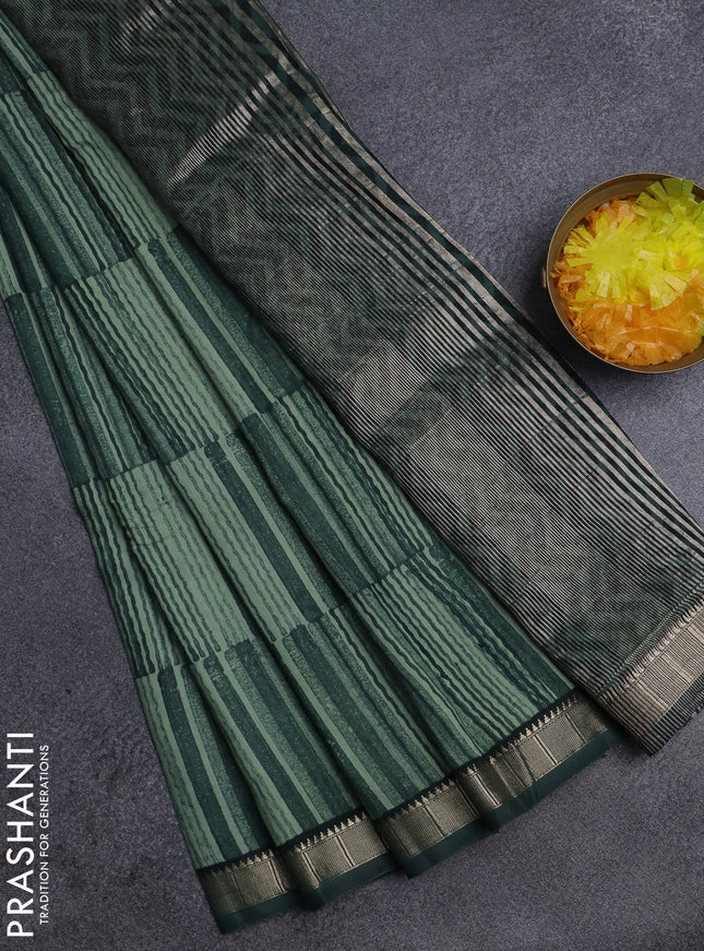 Semi chanderi saree green shade and green with allover stripe pattern and zari woven border