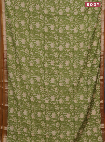 Semi chanderi saree light green and mustard shade with floral prints and zari woven border