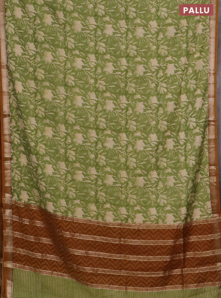 Semi chanderi saree light green and mustard shade with floral prints and zari woven border