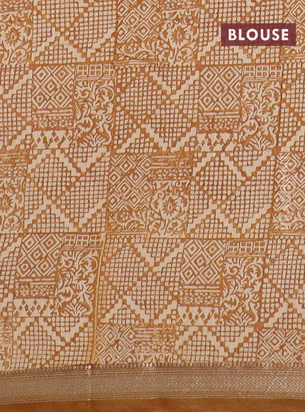 Semi chanderi saree light green and mustard shade with floral prints and zari woven border