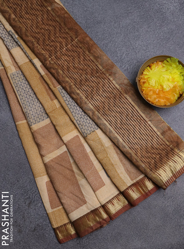 Semi chanderi saree sandal and maroon shade with geometric prints and zari woven border