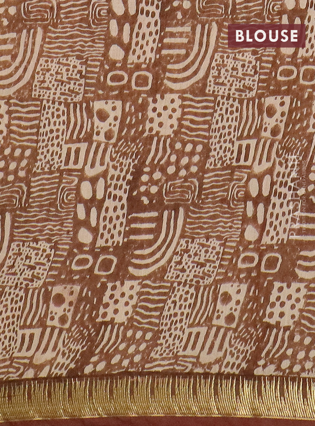 Semi chanderi saree sandal and maroon shade with geometric prints and zari woven border