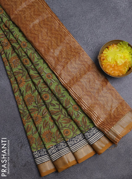 Semi chanderi saree light green and mustard shade with allover floral prints and zari woven border