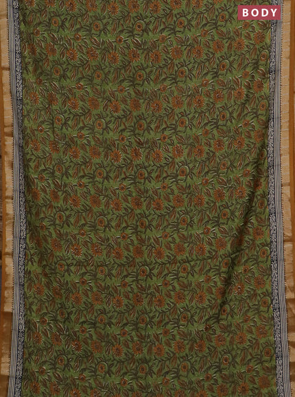 Semi chanderi saree light green and mustard shade with allover floral prints and zari woven border