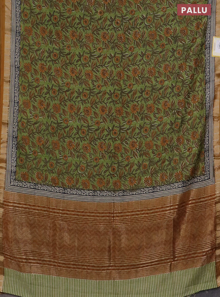 Semi chanderi saree light green and mustard shade with allover floral prints and zari woven border