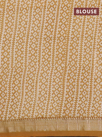 Semi chanderi saree light green and mustard shade with allover floral prints and zari woven border