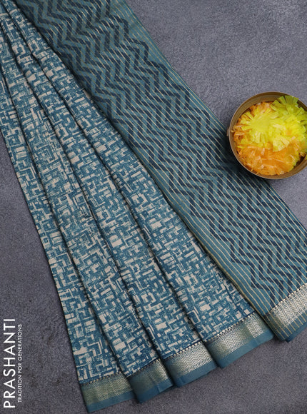 Semi chanderi saree teal blue and sandal with allover prints and zari woven border
