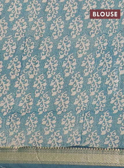 Semi chanderi saree teal blue and sandal with allover prints and zari woven border