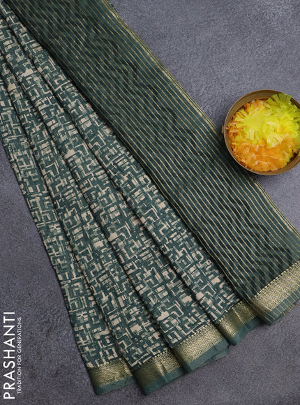 Semi chanderi saree green shade and sandal with allover prints and zari woven border