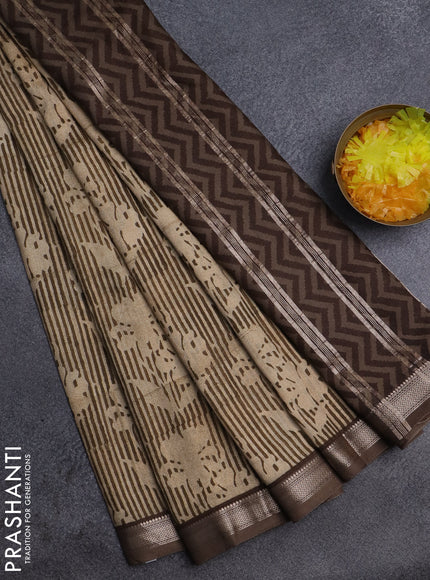 Semi chanderi saree sandal and brown shade with allover floral prints and zari woven border