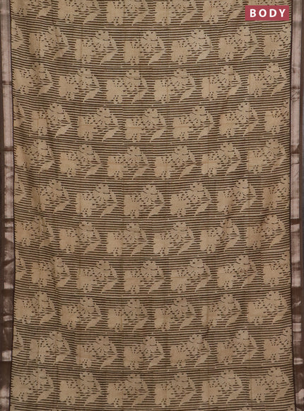 Semi chanderi saree sandal and brown shade with allover floral prints and zari woven border