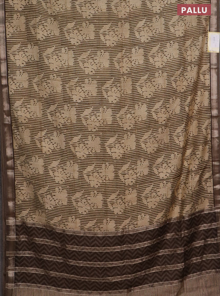 Semi chanderi saree sandal and brown shade with allover floral prints and zari woven border