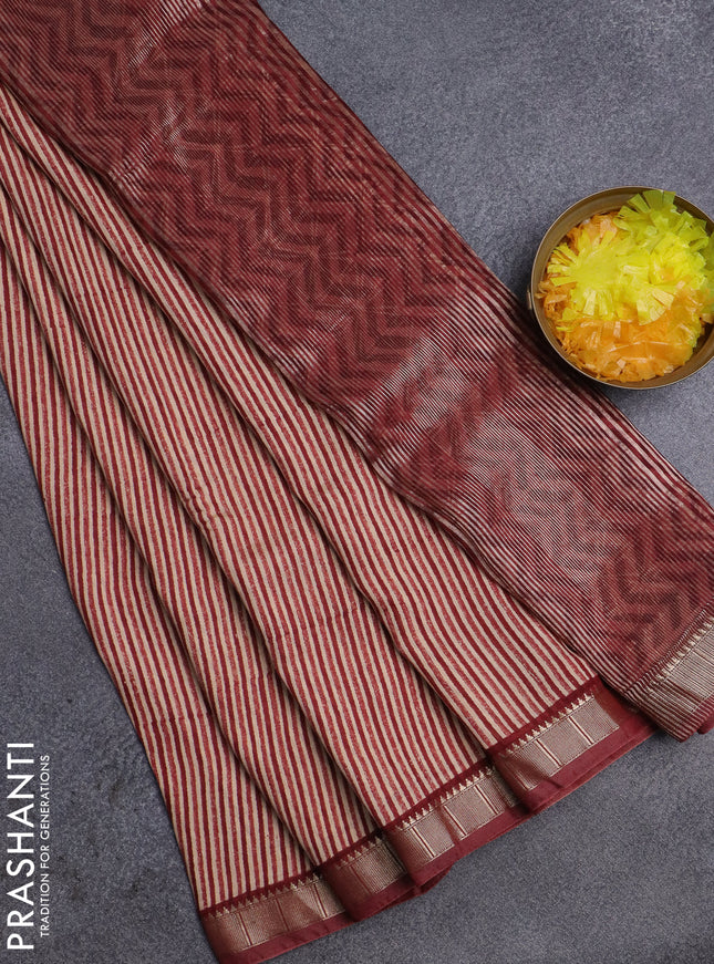 Semi chanderi saree sandal and maroon with allover stripe pattern and zari woven border