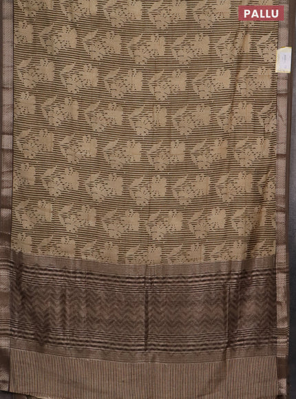 Semi chanderi saree sandal and pastel brown with allover floral prints and zari woven border