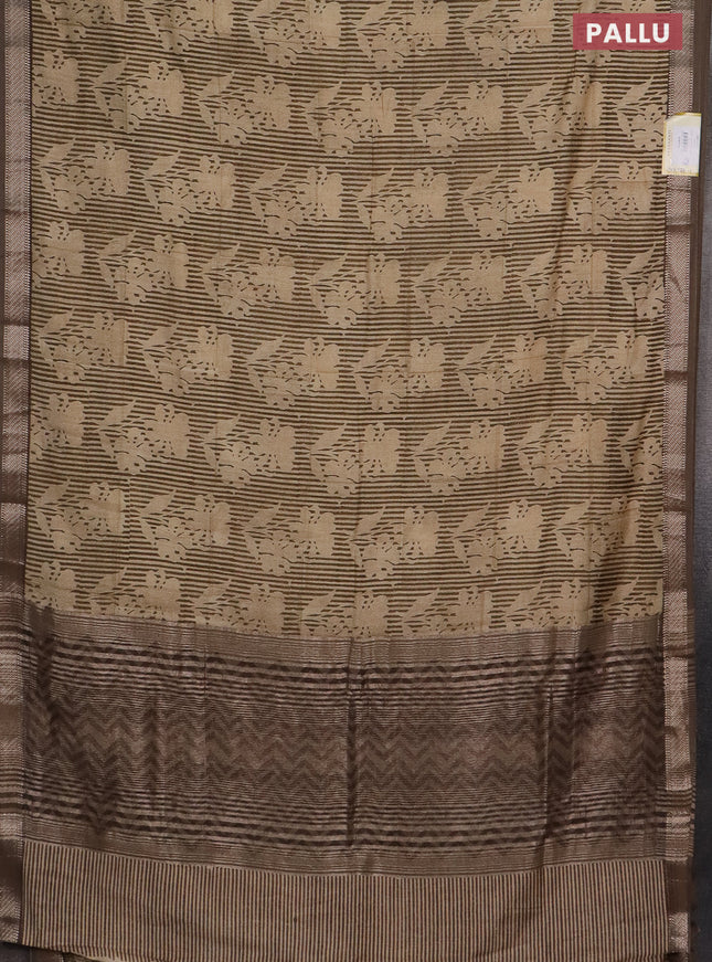 Semi chanderi saree sandal and pastel brown with allover floral prints and zari woven border