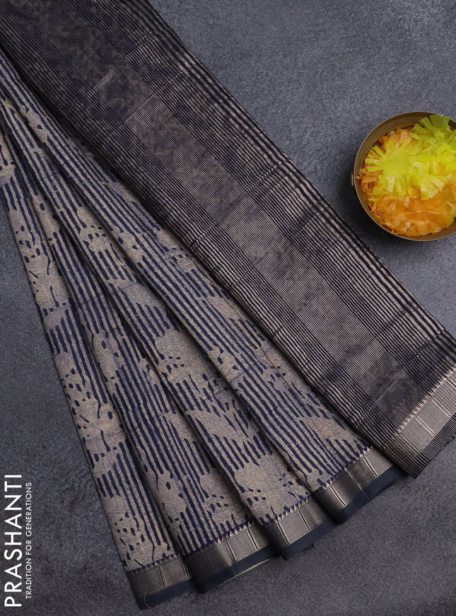 Semi chanderi saree beige and blue with allover floral prints and zari woven border