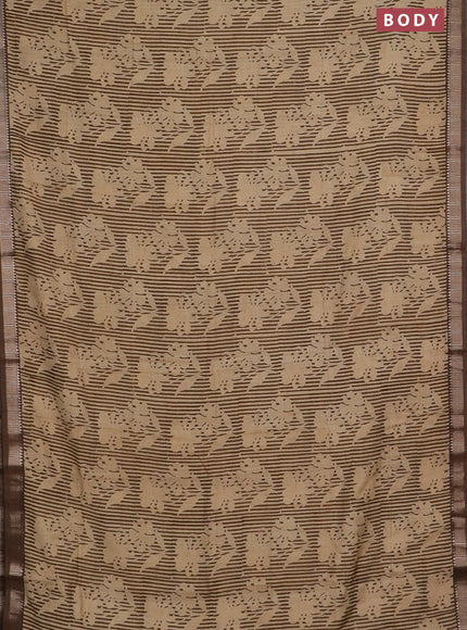 Semi chanderi saree sandal and pastel brown with allover floral prints and zari woven border