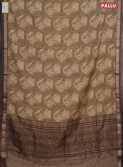 Semi chanderi saree sandal and pastel brown with allover floral prints and zari woven border