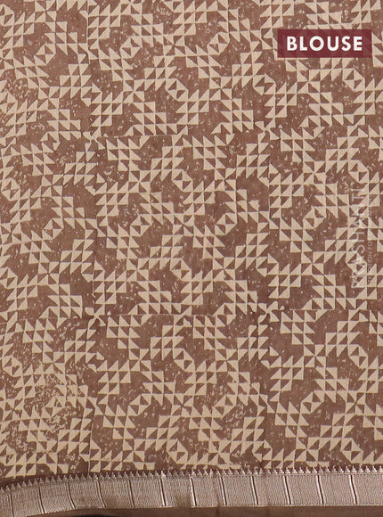 Semi chanderi saree sandal and pastel brown with allover floral prints and zari woven border