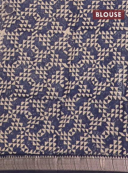 Semi chanderi saree sandal and dark blue with allover floral prints and zari woven border