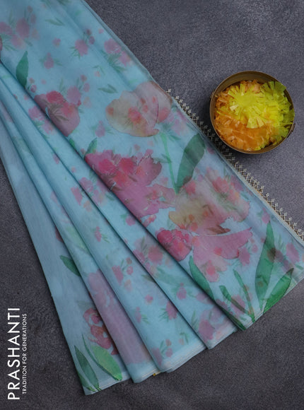 Semi organza saree light blue with floral prints in borderless style