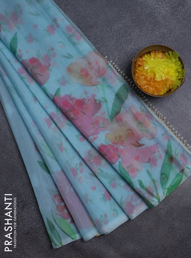 Semi organza saree light blue with floral prints in borderless style