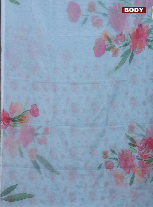 Semi organza saree light blue with floral prints in borderless style
