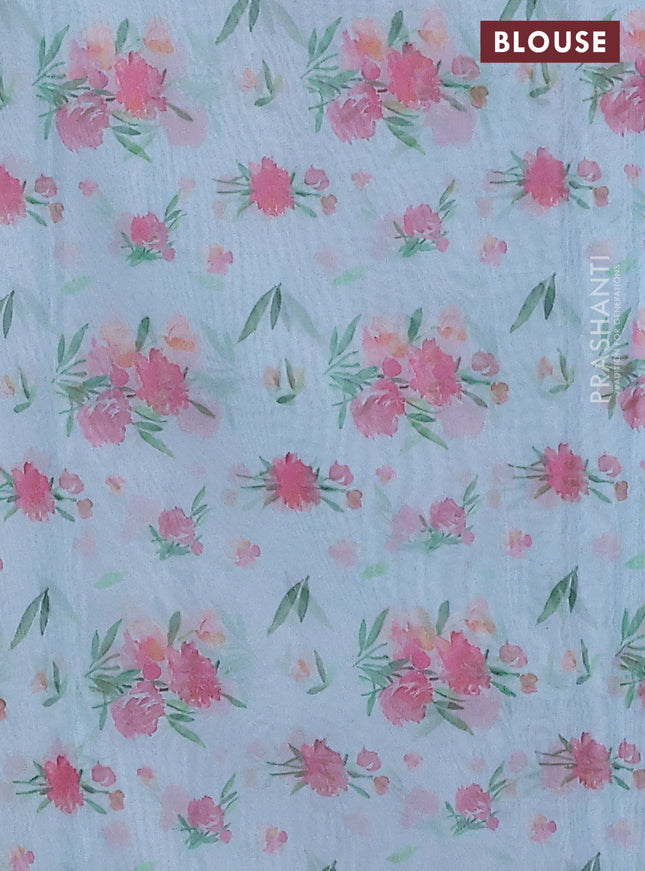 Semi organza saree light blue with floral prints in borderless style