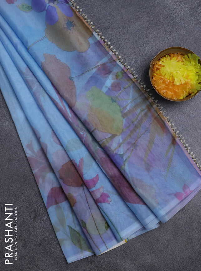 Semi organza saree pastel blue with floral prints in borderless style