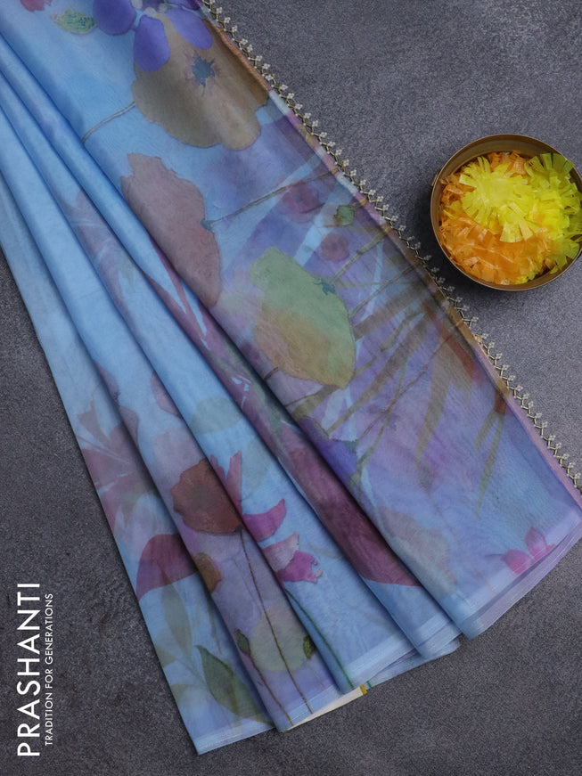 Semi organza saree pastel blue with floral prints in borderless style